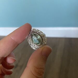Sterling silver filigree swirl pear shaped pale green stone cocktail ring. 6.5